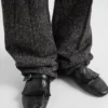 Mules de cuero con correa tipo monk y flecos Mules de cuero con correa tipo monk y flecos