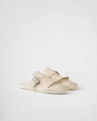 Mules de cuero con flecos Shuffle