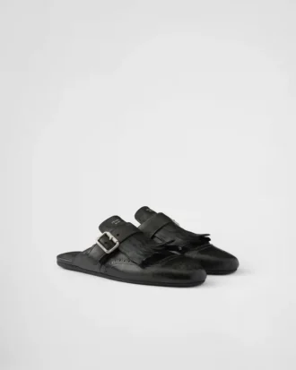 Mules de cuero con flecos Shuffle
