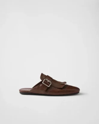 Mules de cuero con flecos Shuffle