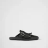 Mules de cuero con flecos Shuffle Mules de cuero con flecos Shuffle