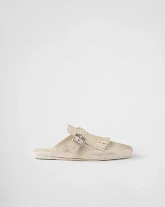 Mules de cuero con flecos Shuffle