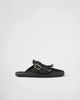 Mules de cuero con flecos Shuffle
