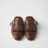 Mules de cuero con flecos Shuffle Mules de cuero con flecos Shuffle