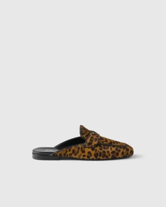 Mules de piel con estampado de leopardo