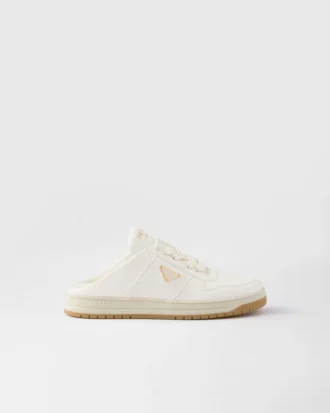 Mules tipo zapatilla de piel napa