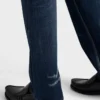 Pantalones de mezclilla con lavado regular Pantalones de mezclilla con lavado regular