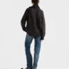 Pantalones de mezclilla con ribete y corte cónico Pantalones de mezclilla con ribete y corte cónico