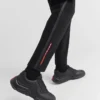 Pantalones de tejido técnico con cinta termosellada Pantalones de tejido técnico con cinta termosellada