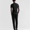 Pantalones de tejido técnico con cinta termosellada Pantalones de tejido técnico con cinta termosellada
