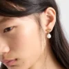 Pendientes de metal con perlas