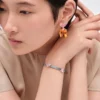 Pulsera Couleur Vivante – Oro blanco con morganita y aguamarina Pulsera Couleur Vivante – Oro blanco con morganita y aguamarina