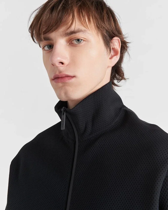 Sudadera con cuello alto y cremallera de punto técnico Sudadera con cuello alto y cremallera de punto técnico