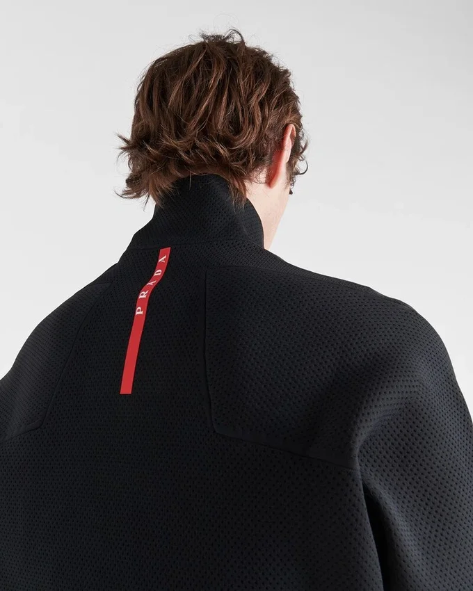 Sudadera con cuello alto y cremallera de punto técnico Sudadera con cuello alto y cremallera de punto técnico