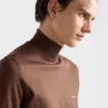 Suéter de algodón con cuello alto
