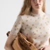 Suéter de lana con cuello redondo y estampado floral
