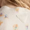 Suéter de lana con cuello redondo y estampado floral