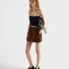 Top bandeau de lana y cachemira con colgante