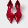 Zapatos de tacón de cuero con laterales abiertos Zapatos de tacón de cuero con laterales abiertos